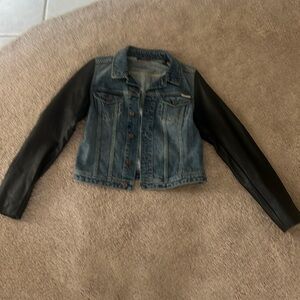 Jean jacket with leather sleeves. Size M. Brand new with tags.